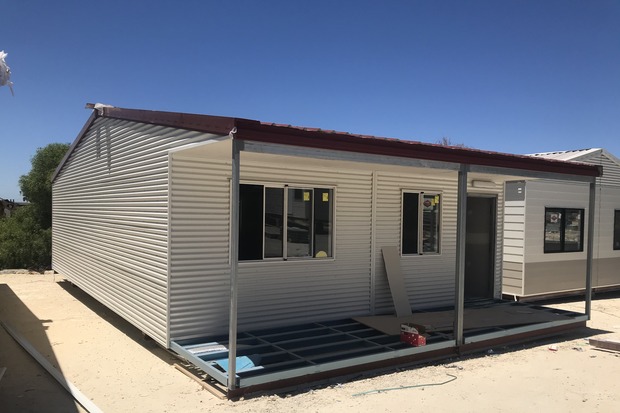 Modular building under construction with metal framing and panel installation by Rapid Modular WA, offering fast and customizable prefabricated solutions for industrial and commercial projects in Western Australia.