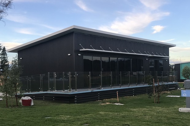 Sleek, modern black modular building completed by Rapid Modular WA, showcasing eco-friendly and innovative design solutions for Perth's residential and commercial spaces.